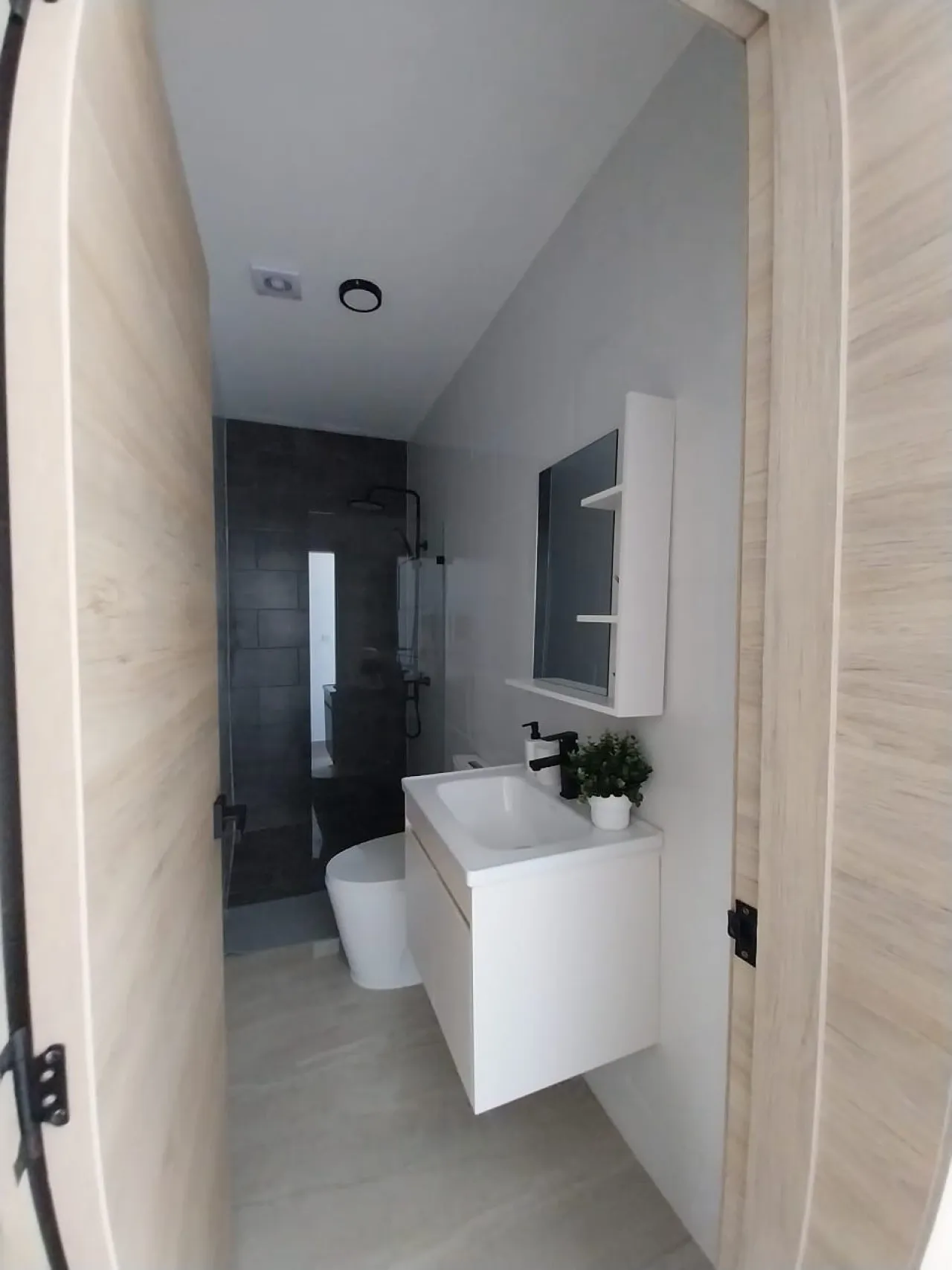Exclusive townhouses for sale with barbecue, pool, and private beach access, 15 minutes from the airport in Punta Cana, Dominican Republic.