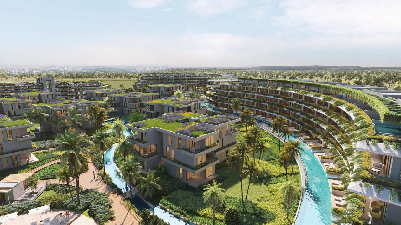 Invierta en un paraíso residencial con piscinas, naturaleza y comodidades de lujo a solo minutos de Playa Bávaro. Apartamentos completamente amueblados.