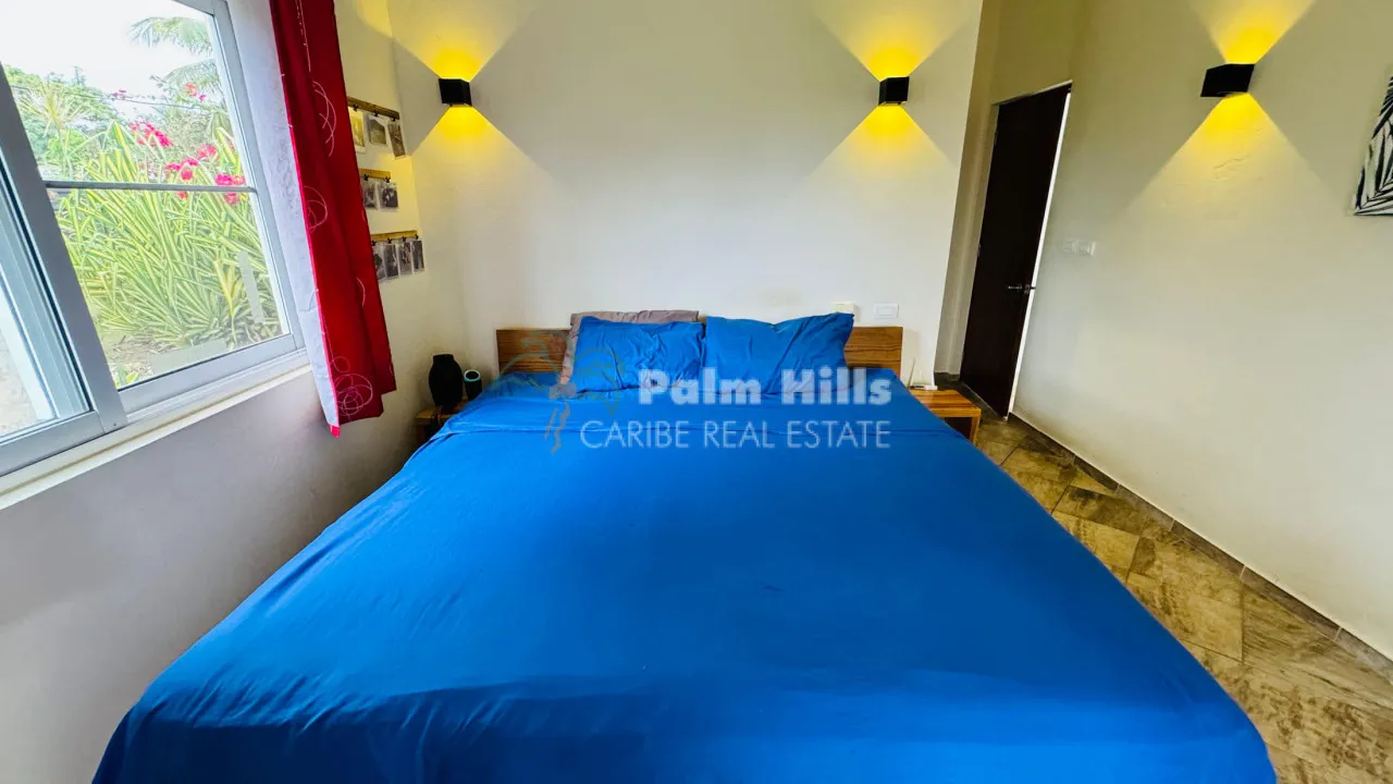 Tropical 3-Bedroom Home Steps from the Beach