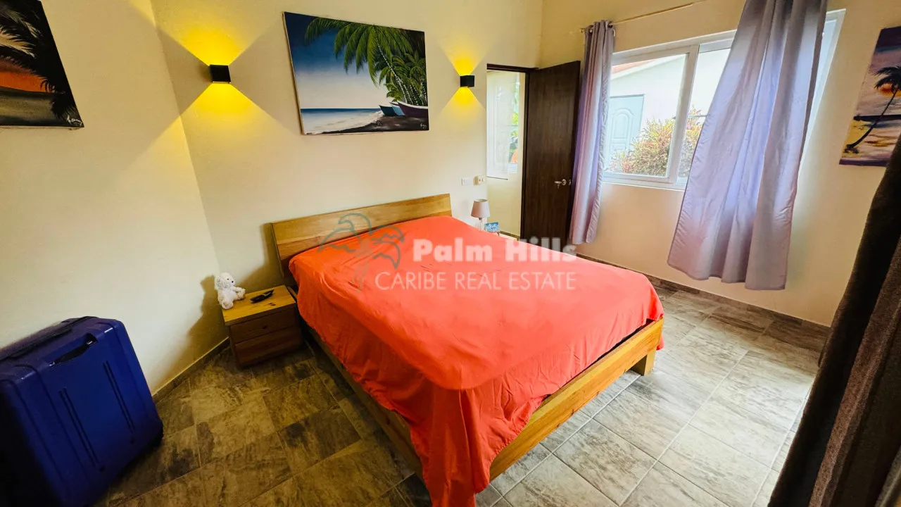 Tropical 3-Bedroom Home Steps from the Beach
