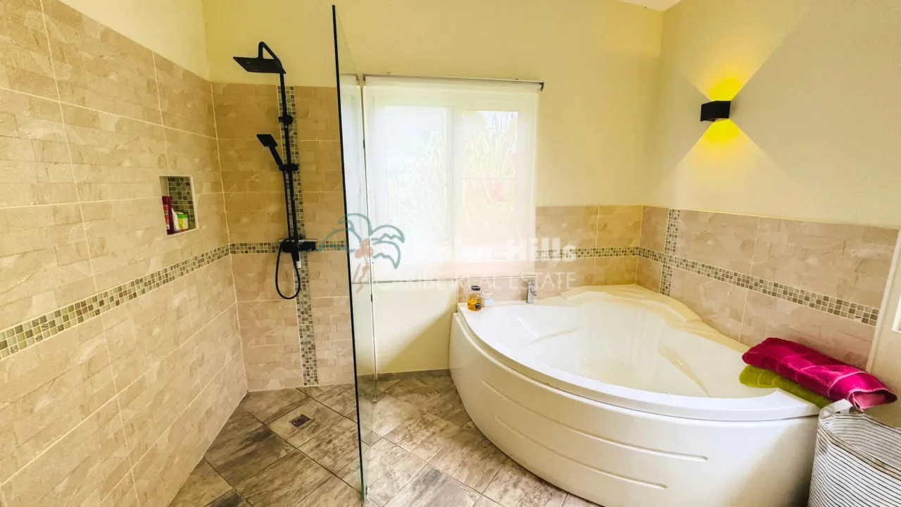 Tropical 3-Bedroom Home Steps from the Beach