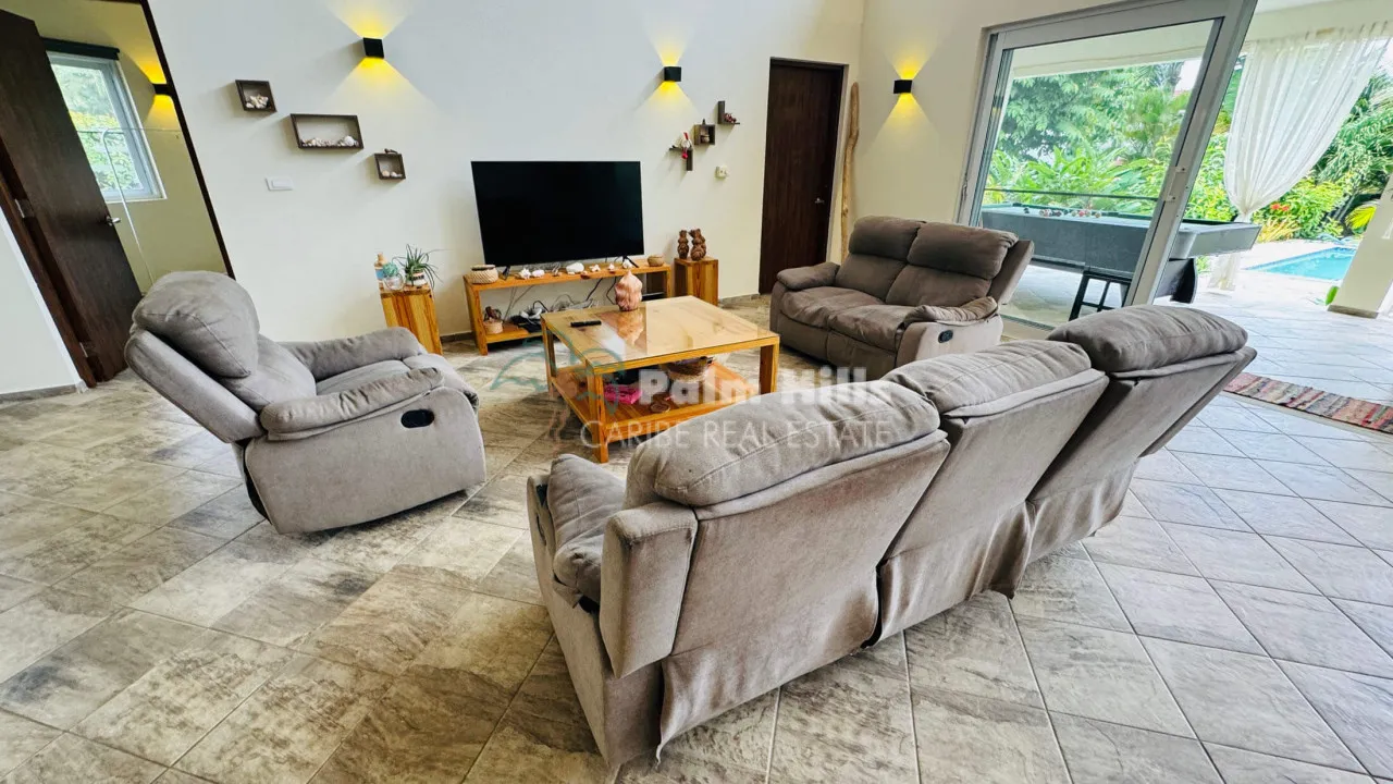 Tropical 3-Bedroom Home Steps from the Beach