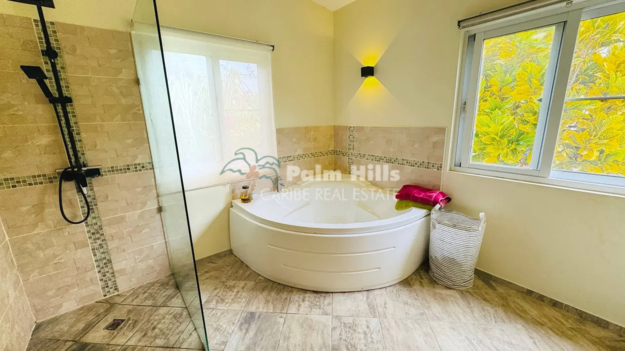 Tropical 3-Bedroom Home Steps from the Beach