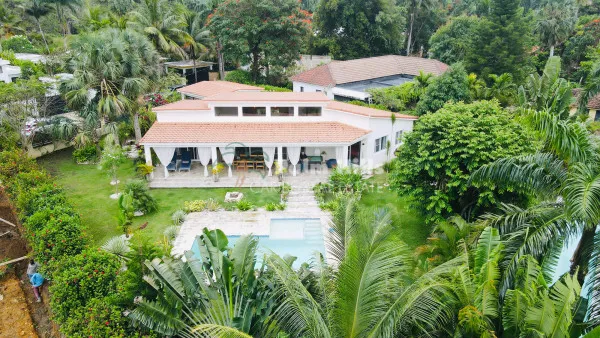 Tropical 3-Bedroom Home Steps from the Beach