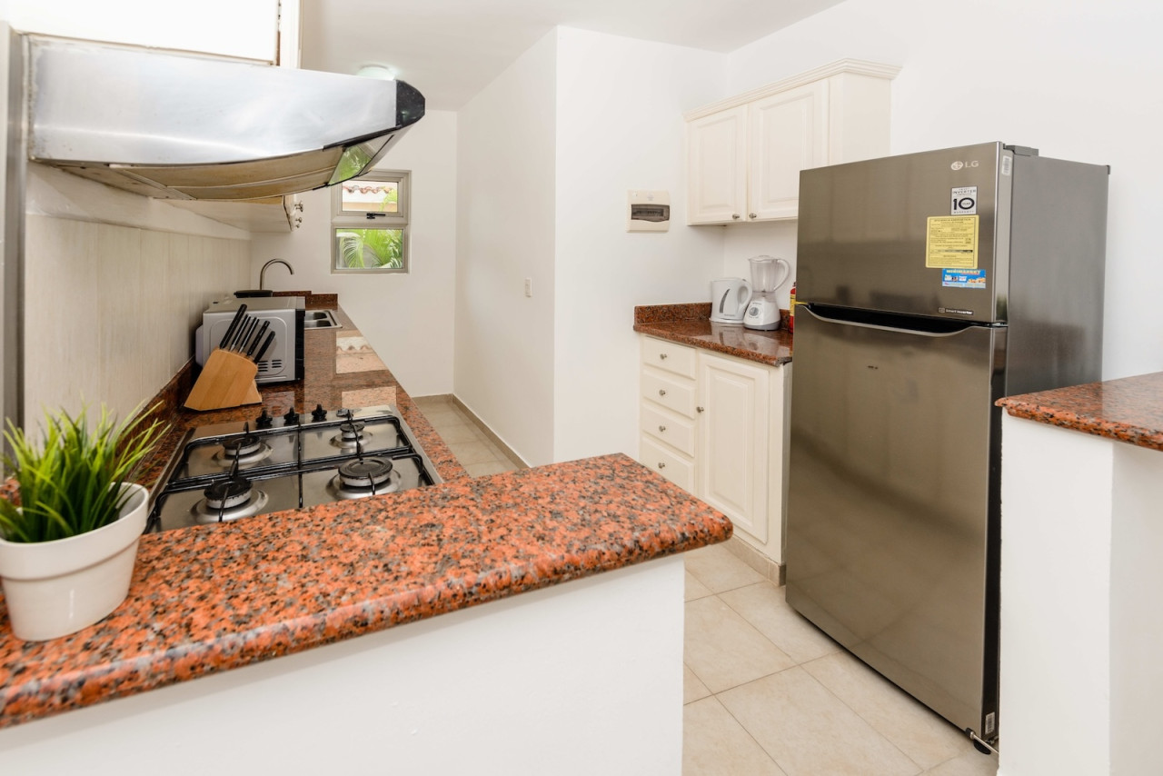 Condominio de 2 habitaciones en Bavaro: vida elegante a pasos de la playa