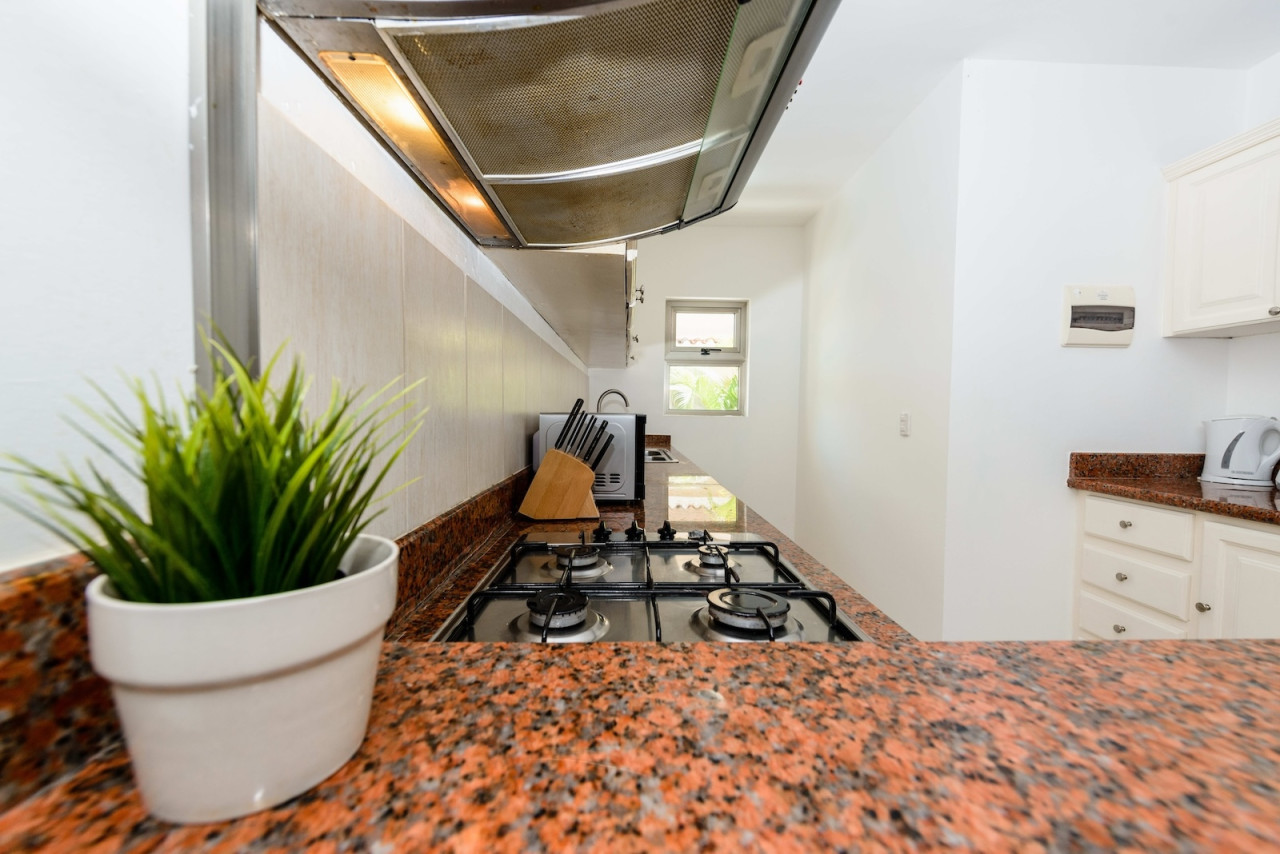 Condominio de 2 habitaciones en Bavaro: vida elegante a pasos de la playa
