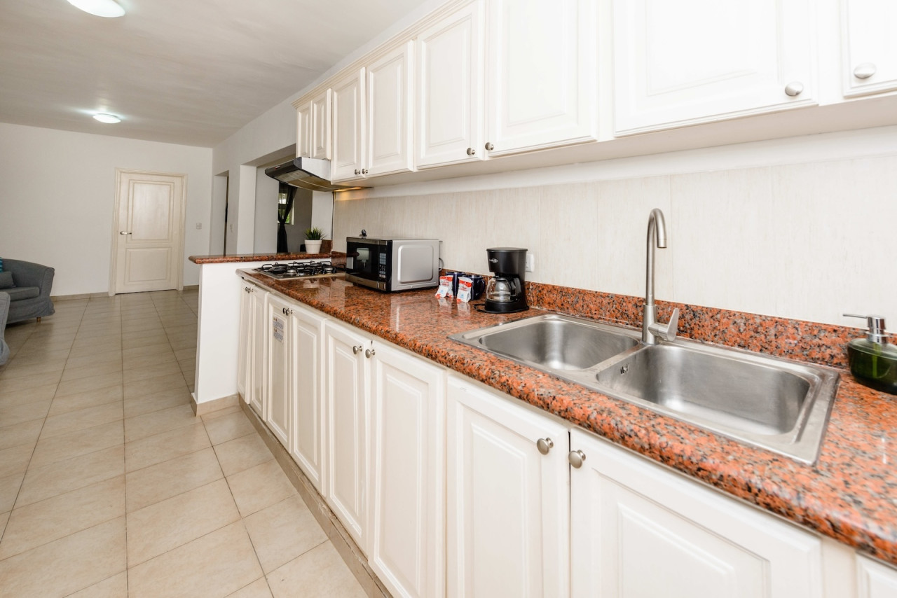 Condominio de 2 habitaciones en Bavaro: vida elegante a pasos de la playa