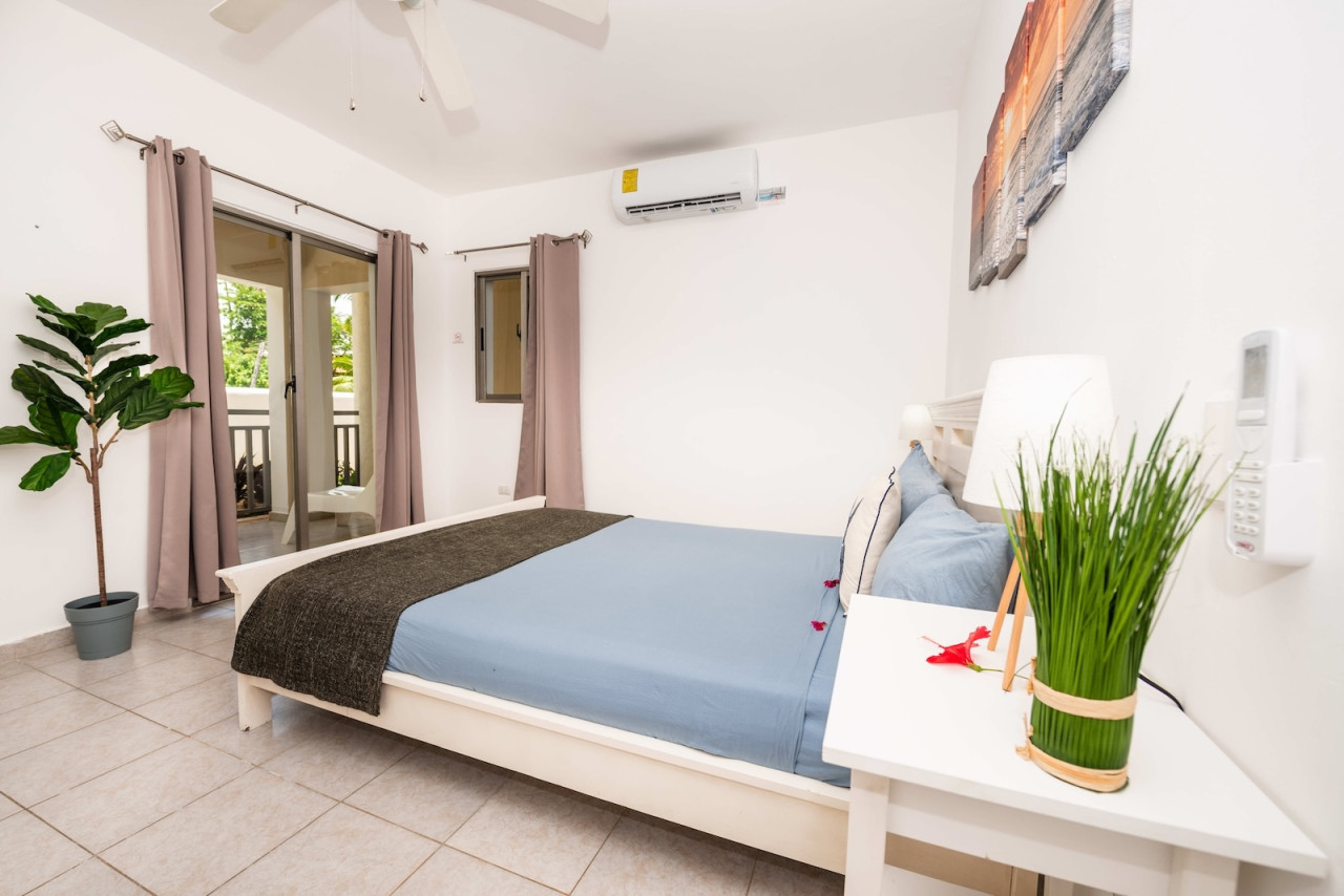 Condominio de 2 habitaciones en Bavaro: vida elegante a pasos de la playa